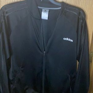 Black zipped up Adidas jacket
